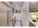 Walk-in pantry with stainless steel refrigerator and shelving at 120 Slate Dr, Buford, GA 30518