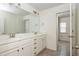 Bathroom featuring a double vanity and a separate room with a toilet at 4583 Grenadine Cir, Acworth, GA 30101