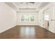 Primary bedroom boasts hardwood floors, a ceiling fan and en suite bathroom at 4583 Grenadine Cir, Acworth, GA 30101