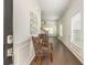 Elegant foyer with hardwood floors, decorative art, and a clear view into the open living space at 4583 Grenadine Cir, Acworth, GA 30101