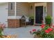 Inviting front entrance features a comfortable bench and decorative plants, enhancing curb appeal at 4583 Grenadine Cir, Acworth, GA 30101