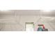 Attached garage offers overhead rack storage to maximize space and organization at 4583 Grenadine Cir, Acworth, GA 30101