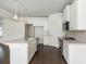 Open kitchen design with a center island, stainless appliances and hardwood floors at 4583 Grenadine Cir, Acworth, GA 30101