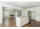 Modern open-concept kitchen with a center island and stainless steel appliances at 4583 Grenadine Cir, Acworth, GA 30101