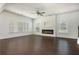 Bright living room featuring a modern fireplace and large windows providing ample natural light at 4583 Grenadine Cir, Acworth, GA 30101