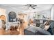 Stylish living room featuring a large sectional sofa, hardwood floors, and gray walls at 46 Le Parc Fontaine, Lithonia, GA 30038