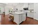 Bright kitchen with white cabinetry, stainless steel appliances, and an island with seating at 5534 Parkerton Ln, Atlanta, GA 30342