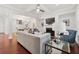 Bright living room with coffered ceiling, fireplace, and hardwood floors at 5534 Parkerton Ln, Atlanta, GA 30342