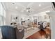 Open floor plan living space with hardwood floors, modern decor, and ample natural light at 5534 Parkerton Ln, Atlanta, GA 30342