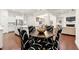 Open living area, kitchen and dining, featuring hardwood floors and an open layout at 5534 Parkerton Ln, Atlanta, GA 30342