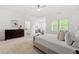 Spacious main bedroom with dresser, sitting area, and natural light at 5534 Parkerton Ln, Atlanta, GA 30342