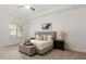 Serene main bedroom with plush carpet, tray ceiling, and neutral decor at 5534 Parkerton Ln, Atlanta, GA 30342