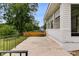 Back porch of home with brick and metal railing at 1083 Amelia Sw Dr, Marietta, GA 30060