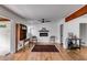 Cozy living room featuring hardwood floors, fireplace, and stylish decor at 1083 Amelia Sw Dr, Marietta, GA 30060