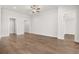Spacious living area with wood floors and crown molding at 1629 Tielman Way, Snellville, GA 30078