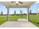 Covered patio with a ceiling fan and a view of the backyard at 1629 Tielman Way, Snellville, GA 30078