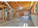 Unfinished basement with exposed ceiling and utilities, with potential for storage or customization at 328 West Ln, Woodstock, GA 30188