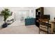 Inviting living room with a comfortable sofa, carpet, and TV at 3291 Meadow Lily Ct, Buford, GA 30519