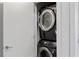 Convenient laundry closet featuring a stacked washer and dryer at 415 Gartrell Se St # 15, Atlanta, GA 30312