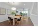 Open-concept living room with modern furniture, hardwood floors, and large windows that provide natural light at 415 Gartrell Se St # 15, Atlanta, GA 30312