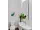 Chic powder room with modern sink, stylish mirror, and artistic accents at 415 Gartrell Se St # 15, Atlanta, GA 30312