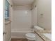 Bathroom featuring a shower-tub combo and granite vanity at 482 Tarragon Sw Way, Atlanta, GA 30331