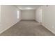 Cozy carpeted bedroom with ample natural light at 482 Tarragon Sw Way, Atlanta, GA 30331