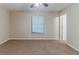 This bedroom features neutral walls, and carpet, offering a serene space at 482 Tarragon Sw Way, Atlanta, GA 30331