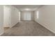 Carpeted living room with sliding glass door at 482 Tarragon Sw Way, Atlanta, GA 30331