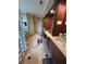 Spacious bathroom with double vanity and mirrors, glass block accents, and neutral tiled floor at 716 Bethpage Dr, Mcdonough, GA 30253