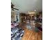 Eat-in kitchen with wooden cabinets, granite countertops and barstool seating at 716 Bethpage Dr, Mcdonough, GA 30253