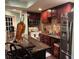 The kitchen features wood cabinets, granite counters, tile backsplash, stainless steel refrigerator, and modern appliances at 716 Bethpage Dr, Mcdonough, GA 30253