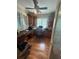 Well-lit home office with built-in desk and cabinets for organization at 716 Bethpage Dr, Mcdonough, GA 30253