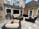 Charming patio area featuring comfortable seating, an awning, and elegant outdoor decor at 716 Bethpage Dr, Mcdonough, GA 30253
