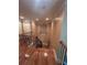 A staircase leading to the second floor features hardwood floors and ornate wrought iron railing at 716 Bethpage Dr, Mcdonough, GA 30253