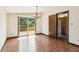 Bright dining room with hardwood floors and sliding door access to the outdoor deck at 3623 Doroco Dr, Atlanta, GA 30340