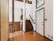 Inviting foyer with hardwood floors, a staircase, and a bright front door with decorative glass at 3623 Doroco Dr, Atlanta, GA 30340