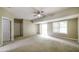 Spacious bedroom with neutral carpet and sliding glass doors to outdoor area at 5958 Tate Dr, Austell, GA 30106