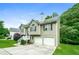 Charming two-story home with a two-car garage and well-maintained landscaping at 5958 Tate Dr, Austell, GA 30106