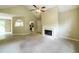 Open concept living area with fireplace flowing into kitchen area at 5958 Tate Dr, Austell, GA 30106
