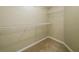 Walk-in closet with built-in shelving for organized storage at 5958 Tate Dr, Austell, GA 30106