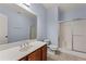 Bathroom features wood vanity, white countertops, and a glass-enclosed shower at 871 Windsor Creek Dr, Grayson, GA 30017