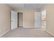 Bedroom featuring closet with wire shelving and doors leading to other spaces at 871 Windsor Creek Dr, Grayson, GA 30017