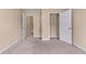 Bedroom featuring closet with shelving and doors leading to other spaces at 871 Windsor Creek Dr, Grayson, GA 30017