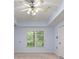 Bedroom featuring a ceiling fan with light fixtures, enhancing the room's ambiance at 871 Windsor Creek Dr, Grayson, GA 30017