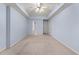 Spacious bedroom featuring a ceiling fan and doors leading to other spaces at 871 Windsor Creek Dr, Grayson, GA 30017