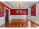 Elegant dining room featuring hardwood floors and neutral accents at 871 Windsor Creek Dr, Grayson, GA 30017