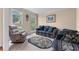 Cozy living room filled with natural light and comfortable seating at 871 Windsor Creek Dr, Grayson, GA 30017