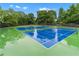 Dual, modern tennis courts in community with lush surroundings at 871 Windsor Creek Dr, Grayson, GA 30017
