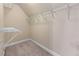 Walk-in closet with wire shelving maximizing storage and organization potential at 871 Windsor Creek Dr, Grayson, GA 30017